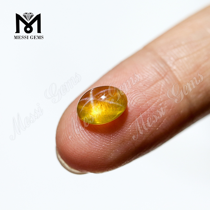 Zafiro creado en laboratorio Cabujón ovalado 7x9 mm Zafiro estrella amarillo
